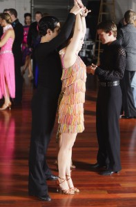 A dancing couple warming up.